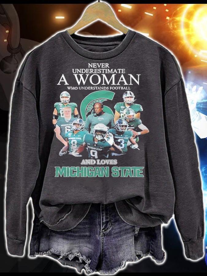 A woman who understands football and loves Michigan Stage signatures shirt t-shirt sweatshirt