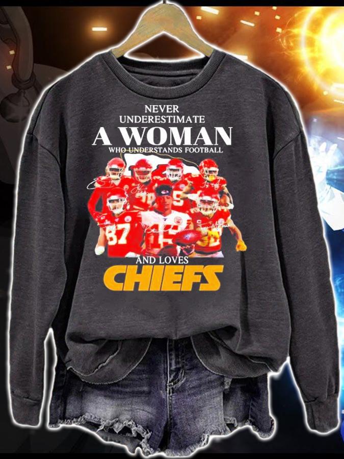 Never underestimate a woman who understands football and Chiefs shirt sweatshirt
